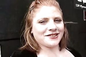 Amateur redhead doesn't mind to flash her large boobs in the street