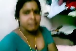 Sexy bulky black skinned Indian housemaid flashes her large mounds