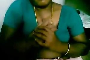 Sexy bulky black skinned Indian housemaid flashes her large mounds