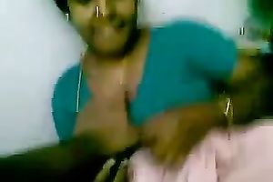 Sexy bulky black skinned Indian housemaid flashes her large mounds