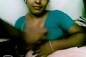 Sexy bulky black skinned Indian housemaid flashes her large mounds