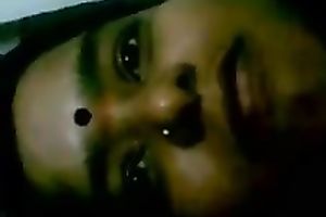 Sexy bulky black skinned Indian housemaid flashes her large mounds