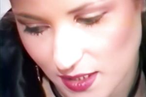 Curvy dominatrix-bitch in leather coat and fishnets gets team-fucked in three-some