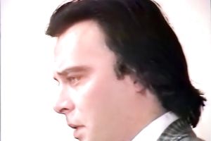 Curvy dominatrix-bitch in leather coat and fishnets gets team-fucked in three-some