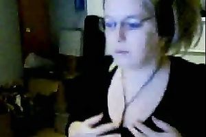 Slutty web camera blond wearing glasses plays with her limber mambos