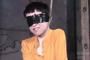 Short-haired whore Mei receives suspended and face-fucked in BDSM movie scene