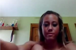 Hot blondie strips and oils up her merry natural titties