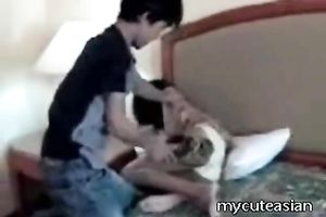 Her boyfriend spanks her miniature slender booty with a shoe