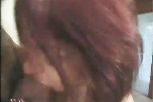 Cum longing redhead is having a nice Male+Male+Female three-some