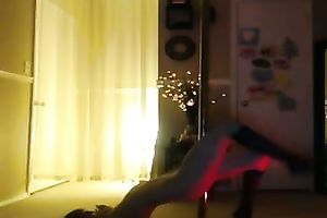 This svelte asian honey with tan lines can't live without pole dancing at home