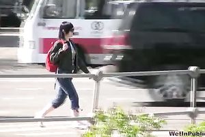 Spoiled brunette hair Tanya pees her capris in the street