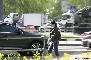 Spoiled brunette hair Tanya pees her capris in the street
