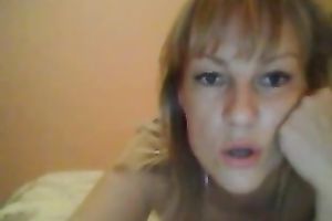 Small tittied livecam model shows off her nicely shaped bum