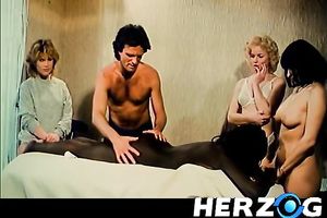 Hot stud gives massage to four ladies and they give him blowjobs in return