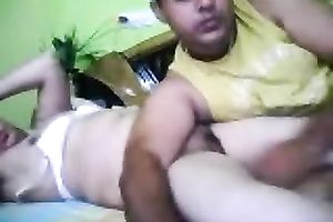 Chubby woman plays with an Indian guy's schlong in front of a livecam