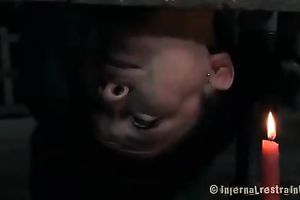 Candle wax flows through girl's twat making her suffer