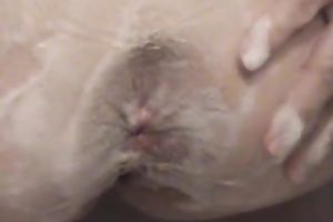 Wife of ally shaves her hairy fanny in the shower and pokes it with dildos