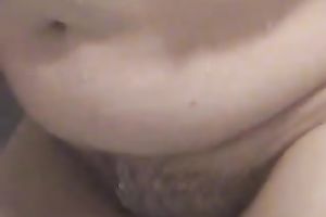 Wife of ally shaves her hairy fanny in the shower and pokes it with dildos