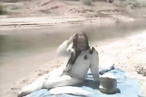 Blonde playgirl receives undressed and gives head on the beach