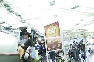 Brunette cutie in legging teases me with her arse in a store