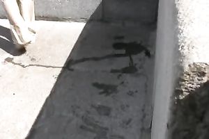 Redhead dilettante skank pees in her panties on the sidewalk