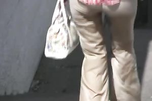 Redhead dilettante skank pees in her panties on the sidewalk