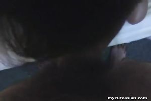 Asian hussy manages to milk a dude's prick in her throat