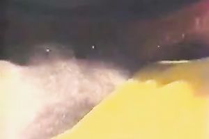 Slutty honey receives her vagina licked and group-fucked on a beach in retro vid