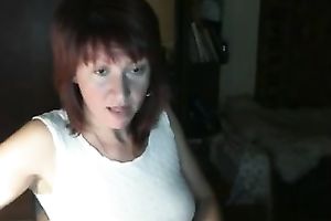 Red-haired Russian nympho in denim shorts likes masturbating on webcam
