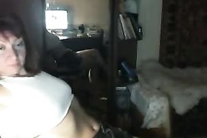 Red-haired Russian nympho in denim shorts likes masturbating on webcam