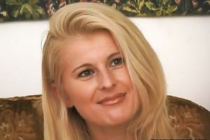 Blonde porn star Sandra Russo disrobes and enjoys group sex