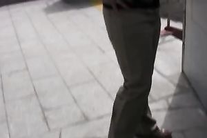 Chubby short-haired whore pees in her panties outdoors