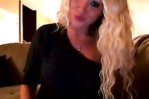 Big breasted cam charmer tickles her pussy with her sextoy