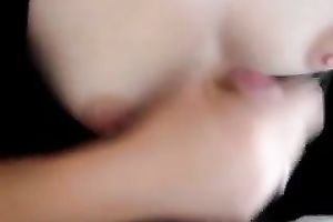 Jerking off a knob on titties and sperm on 'em