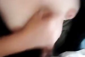 Jerking off a knob on titties and sperm on 'em