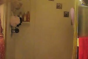 Homemade solo scene with a fleshly redhead playgirl taking a shower