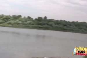 Horny guy rubs sunscreen all over his girlfriend's in nature's garb body