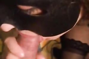 Masked trollop with big love melons knows how to give a admirable oral-sex