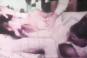 Brunette chick banged by 3 shaggy fellows on the sofa