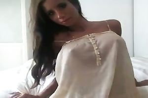 Tanned brunette hair boasts of her fit body and fresh bazookas