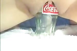 My wet and hungry vagina swallows a bottle with ease