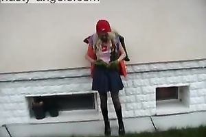 Blonde legal age teenager sweetie flashes her boobies and her bawdy cleft outdoors