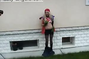 Blonde legal age teenager sweetie flashes her boobies and her bawdy cleft outdoors