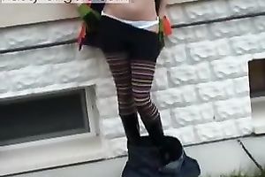 Blonde legal age teenager sweetie flashes her boobies and her bawdy cleft outdoors