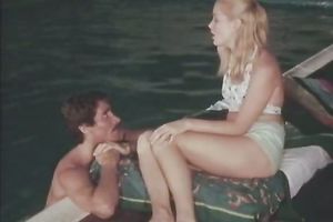 Petite blond sweetie in the pool is already in nature's garb