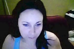 Amateur brunette hair hussy shows her breasts and pierced tongue