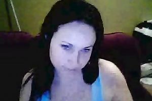 Amateur brunette hair hussy shows her breasts and pierced tongue