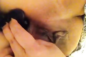 Pokes her soaked love tunnel with dido and finger bonks it at the same time