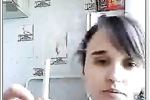 Webcam solo with a teen smokin' and flashing her bra buddies