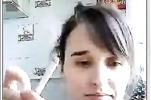 Webcam solo with a teen smokin' and flashing her bra buddies